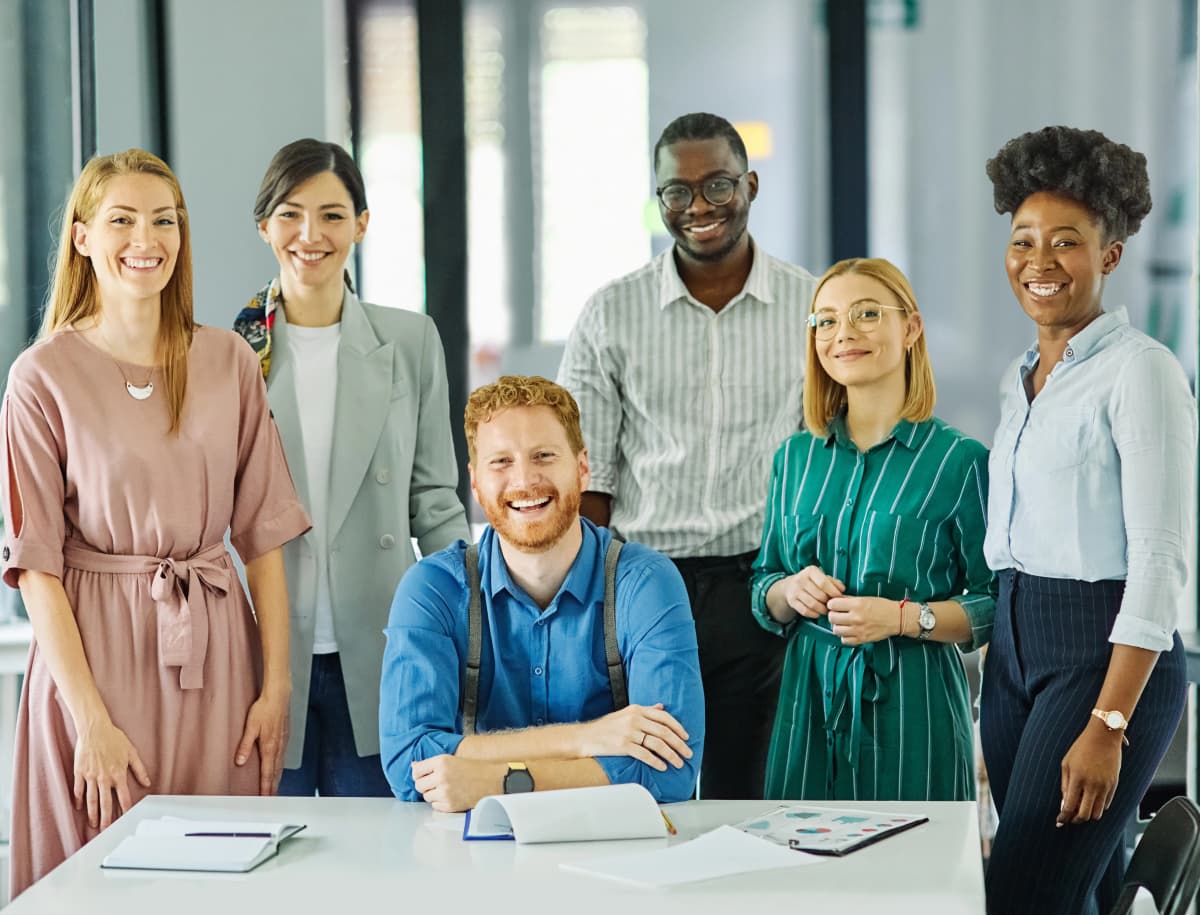 Small business owner reviewing a website design on laptop